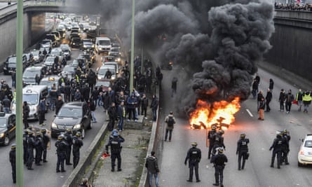 French taxi drivers protesting against private hire services such as Uber.