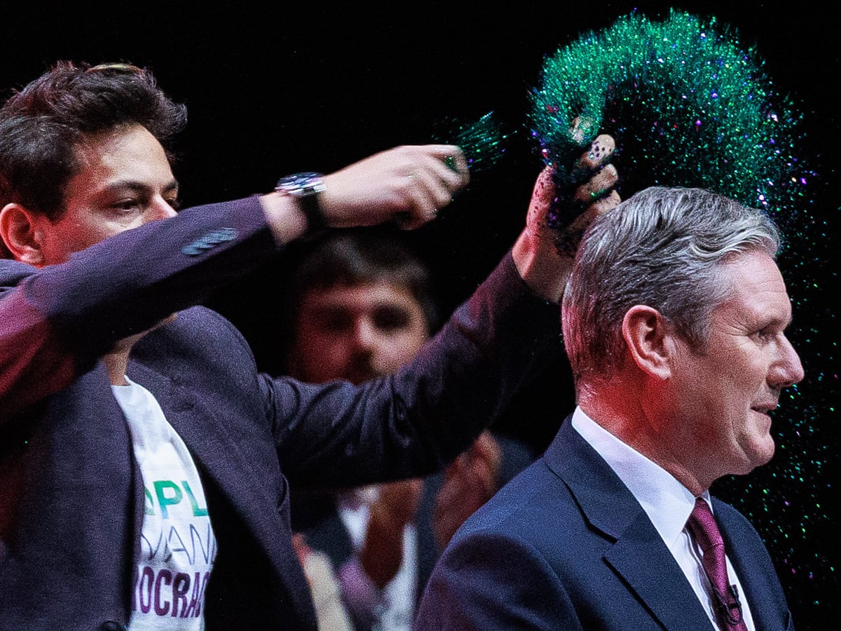 Protester on stage disrupts Keir Starmer speech to Labour conference | UK news | The Guardian
