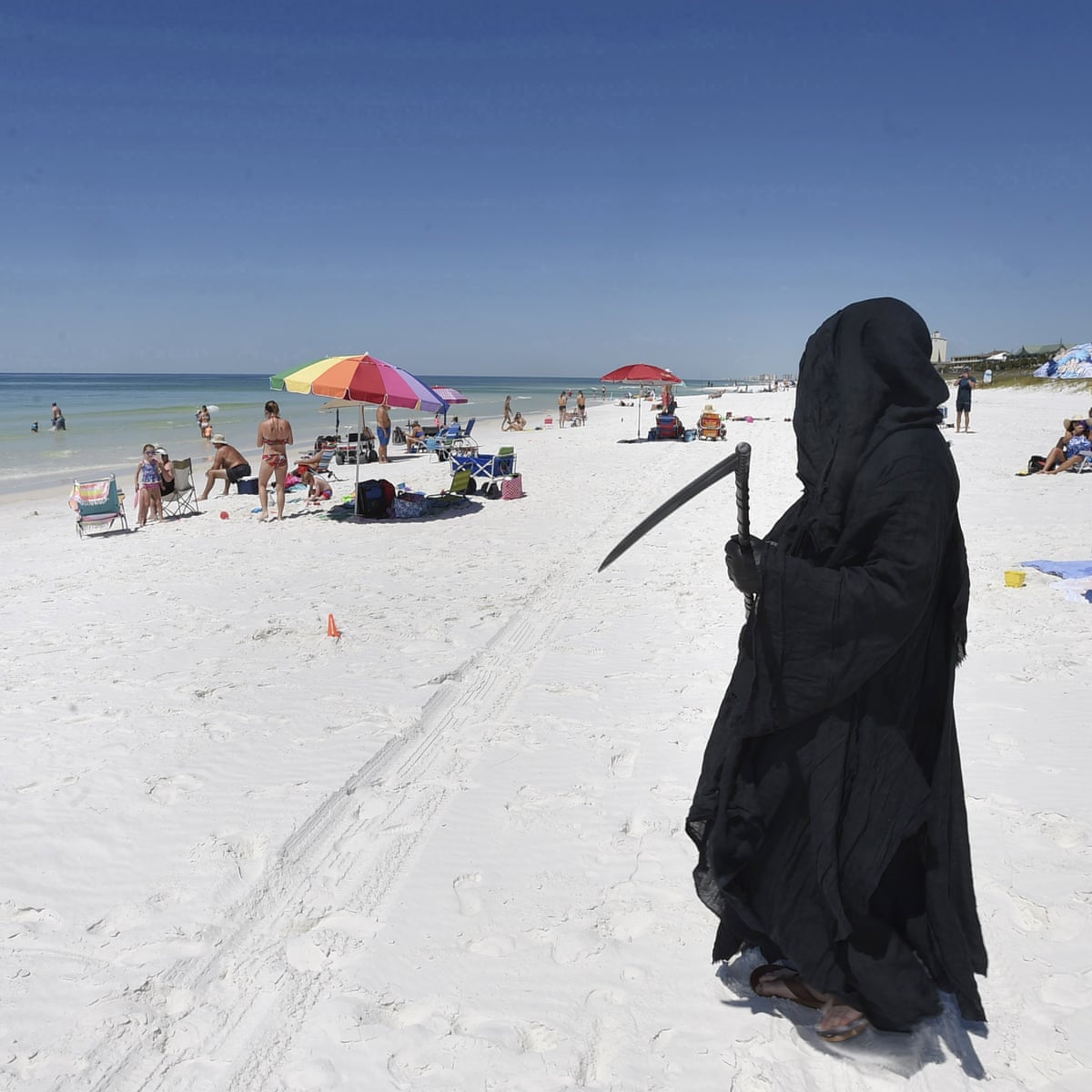 Florida Man Stalks Beach As Grim Reaper To Protest Reopening Amid Pandemic Florida The Guardian