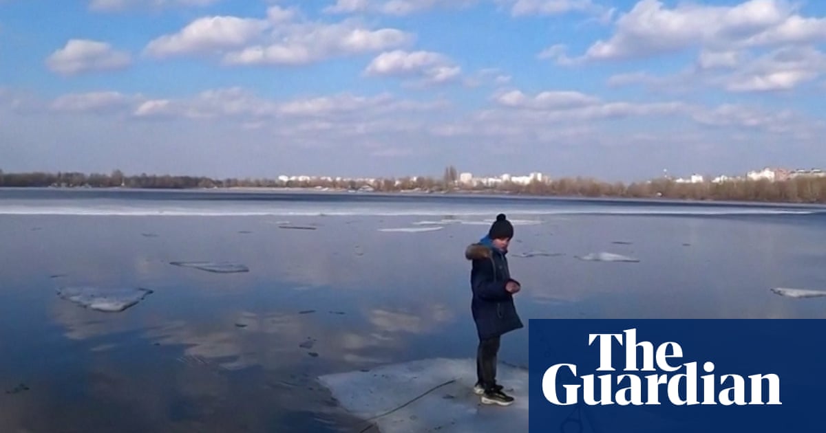 Good catch: Man in Ukraine rescues child floating on ice with fishing rod – video