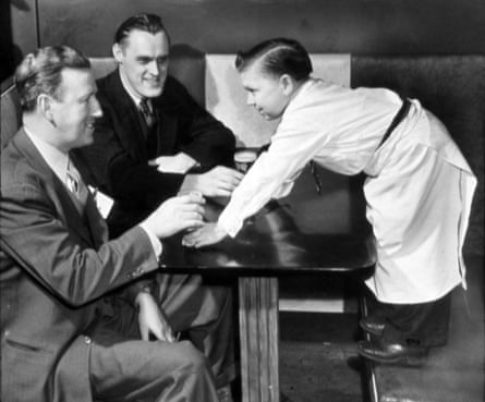 Eddie Gaedel, the smallest player to appear in a Major League Baseball game, is photographed at work in 1951 in St Louis.