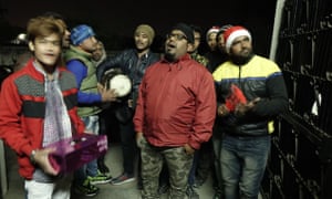 A group of carol singers perform in a Christian locality in Aligarh the day after a carol group was attacked with knife by a suspected Hindu activist in Aligarh.