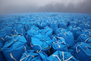 A sea of blue tied-up bags