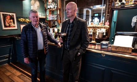 Customers at a West End pub in London on the day after Boris Johnson issued advice on staying away from pubs, theatres and clubs.