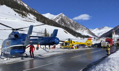 Rescue helicopters stand on a street near the Gammerspitze summit in Tirol after an avalanche killed a 58-year-old local man