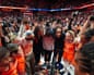 Members of the Connecticut Sun team stand in a circle after a game.