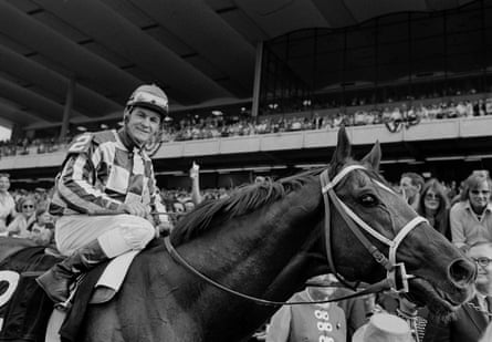 Jockey Ron Turcotte walks Secretariat towards the winners’ circle after winning the 1973 Belmont Stakes before a crowd of 70,000 fans at Belmont Park.