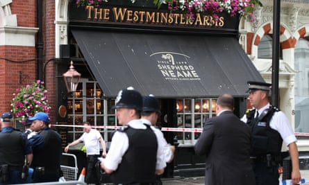 Police officers outside the Westminster Arms
