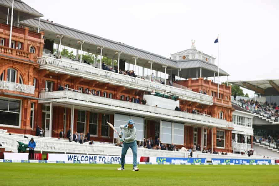 Joe Root warms up in front of the pavilion ahead of play on the fourth day.