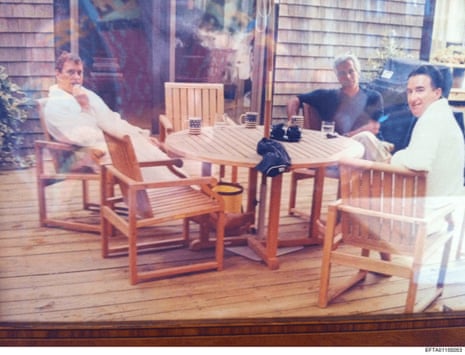 A photo of Andrew Mountbatten-Windsor and Peter Mandelson sat around a table in bathrobes with Jeffrey Epstein.
