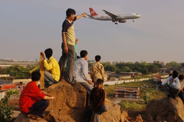 Slum boys living next to the International airport trying to grab a plane, DharaviIn 2004, Mumbai is home to more millionaires than any other city on the Indian sub-continent, but almost half of the population here live in slums. Among diverse backdrops, Rai captures this harsh reality.