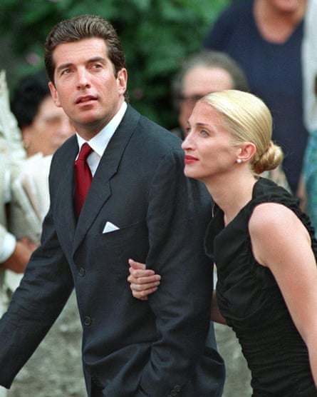 Carolyn Bessette Kennedy in elegant black dress with her husband John F Kennedy Jr