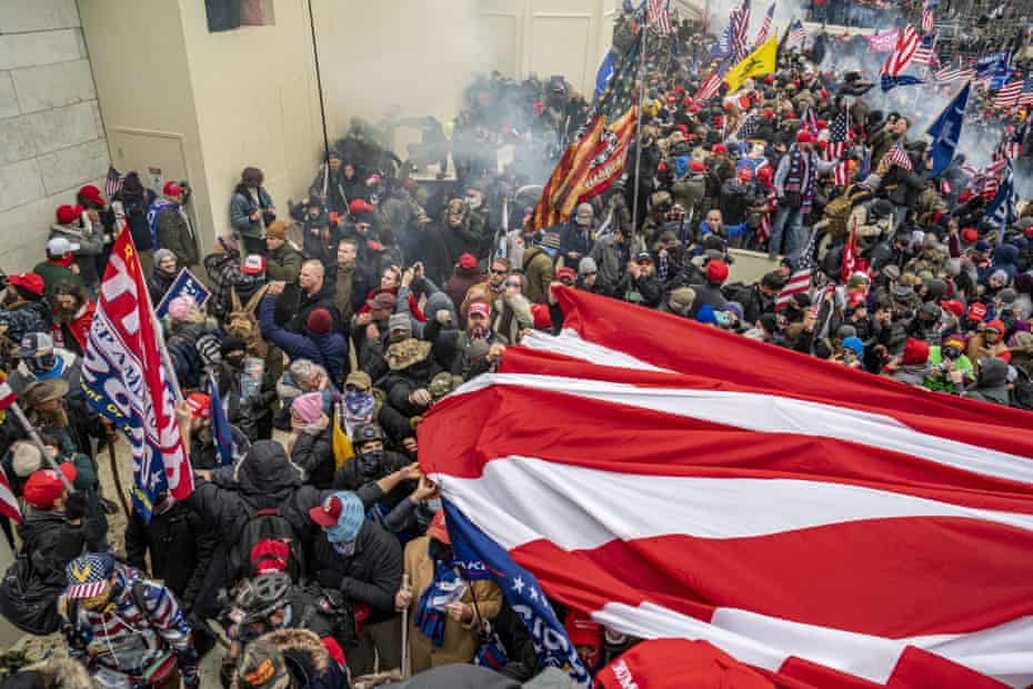Pro-Trump rioters breach the security perimeter and storm the US Capitol.
