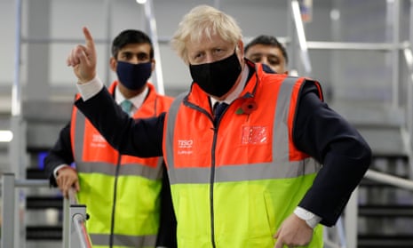 Boris Johnson and Rishi Sunak at a Tesco distribution centre, London, 11 November 2020.