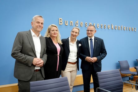 The AfD’s Leif-Erik Holm, Kristin Brinker, Alice Weidel and Tino Chrupalla smiling