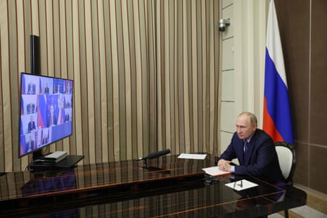 Russia’s president, Vladimir Putin, chairs a security council meeting via a video link in Sochi on 2 November.
