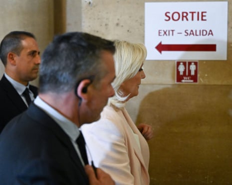 French far-right leader Marine Le Pen leaves the Paris Court of Appeal earlier today.