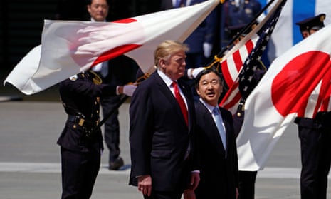 Donald Trump is escorted by Japan’s Emperor Naruhito in Tokyo