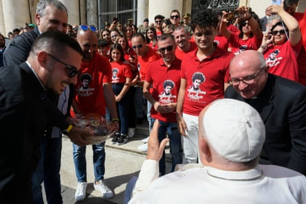 Pope Francis greets supporters of Carlo Acutis in Vatican City in September.