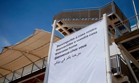 A banner reading ‘Welcome home’ greets migrants aboard the rescue ship Aquarius. Barcelona has pledged to take in 100 of the 629 refugees on board.