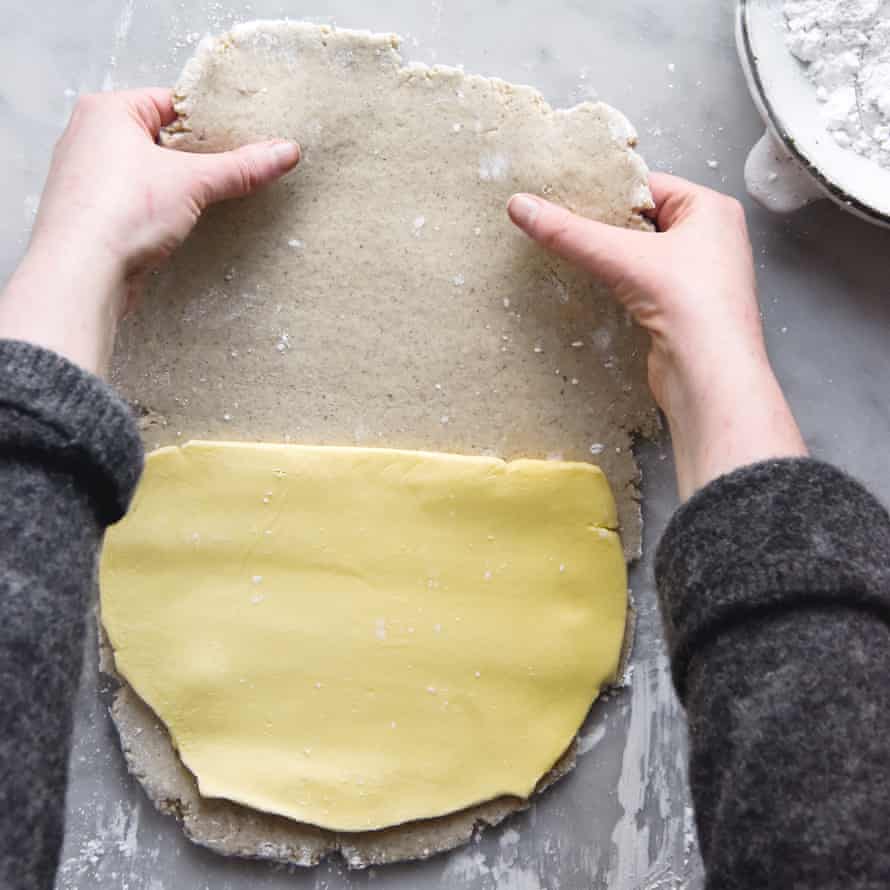 Butter block placed on bottom half of dough rectangle