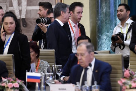 US secretary of state Antony Blinken walks past Russian Foreign Minister Sergei Lavrov during the G20 foreign ministers’ meeting in New Delhi.