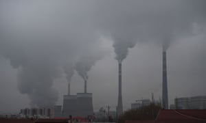 In this photo taken on November 19, 2015, smoke belches from a coal-fired power station near Datong, in China’s northern Shanxi province.
