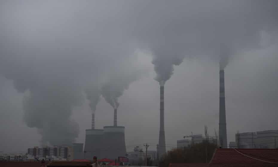 In this photo taken on November 19, 2015, smoke belches from a coal-fired power station near Datong, in China’s northern Shanxi province. 