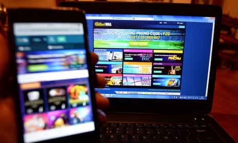 Gambling sites on a computer screen and smartphone screen