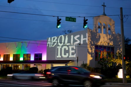 Church with abolish Ice sign projected on it
