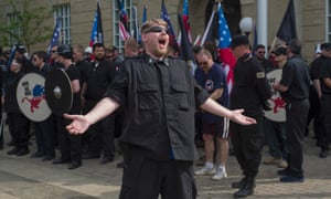 A neo-Nazi goads anti-fascist protesters at opposing demonstrations