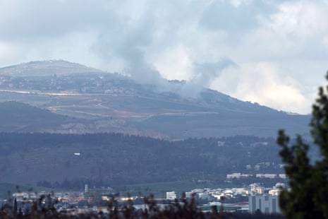 Smoke rises from the village of Odissah in southern Lebanon after an Israeli artillery shelling, as seen from an undisclosed location in northern Israel