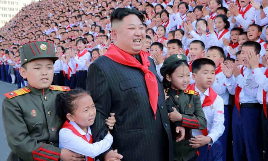 Kim Jong-un poses with participants during the 8th Congress of the Korean Children’s Union in Pyongyang, in 2017.