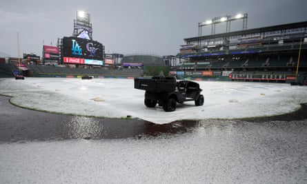 On Thursday, June 29, 2023, Coors Field in Denver was hit by a summer storm with heavy rain, high winds and massive hail that covered tarps and fields.