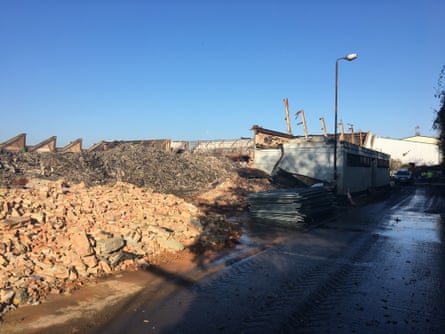 Bricks and rubble are heaped up on a business park site.