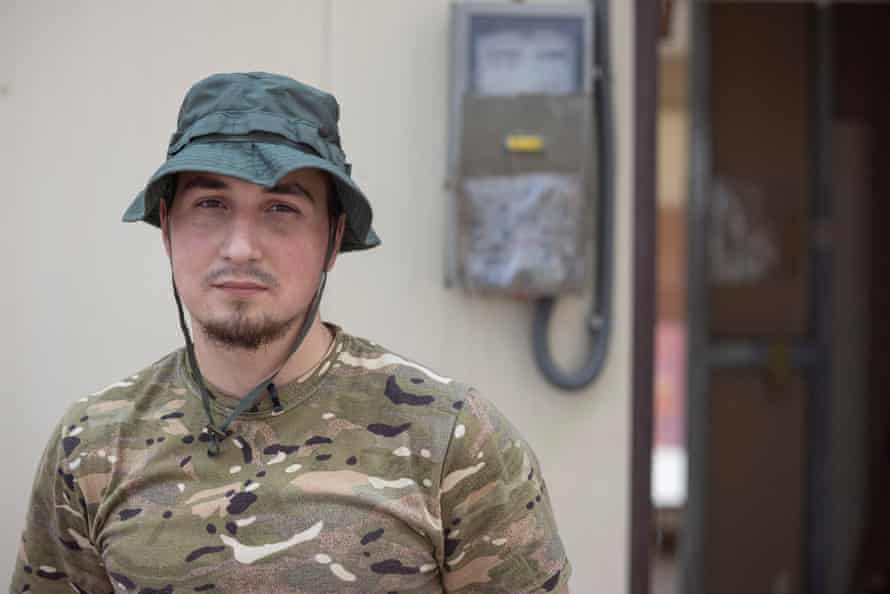 Oleksauk, a soldier who returned from Sievierodonetsk, poses for a picture in Slovyansk, Donetsk region.