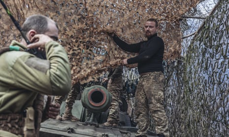 Ukrainian soldiers of the 80th brigade on a tank near Bakhmut.