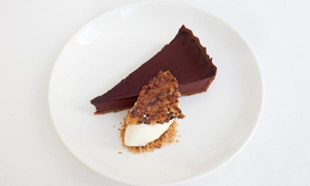 ‘Light and dark on a plate’: chocolate tart.