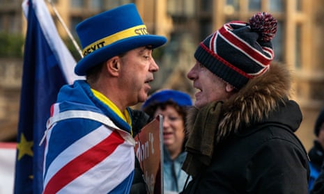 Anti-Brexit protester Steve Bray (L) and a pro-Brexit protester argue as they demonstrate outside the Houses of Parliament in Westminster on January 08, 2019