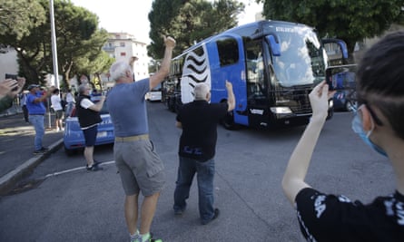 Atalanta supporters venture onto the streets of Bergamo to cheer on the team coach in June.