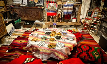 meal on low table with lots of red fabrics