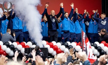 Arne Slot (centre) and the Feyenoord squad celebrate their Dutch Cup success in Rotterdam earlier this week.