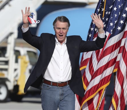 Republican Senator David Perdue of Georgia arrives for Vice-President Mike Pence’s defend the majority rally on 10 December in Augusta.