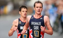 Alistair Brownlee (right) has not been named in the provisional Olympic squad although his brother Jonny (left) has