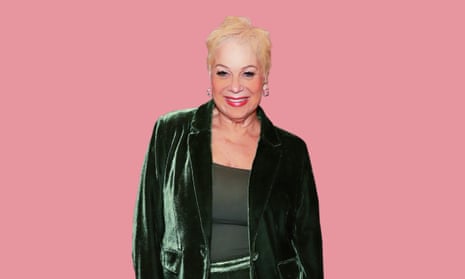 Denise Welch wearing a green velvet suit and a green top