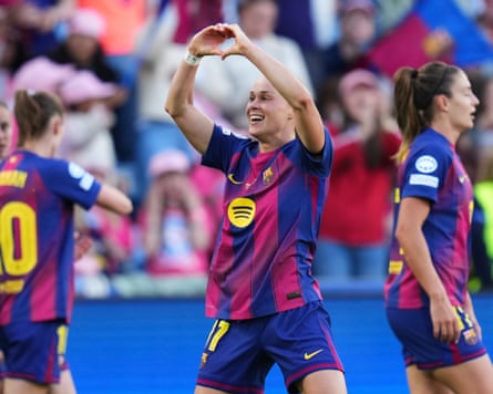 The Barcelona forward Ewa Pajor celebrates by making a heart symbol with her hands after scoring in the Women’s Champions League final against OL Lyonnes