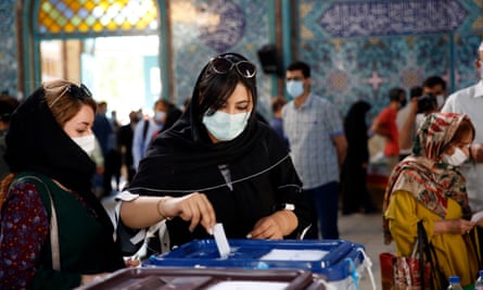 Presidential election in Iranepa09283151 Iranian women cast their vote at a polling station during the presidential election in Tehran, Iran, 18 June 2021. Iranians head to polls to elect a new president after eight years with Hassan Rouhani as head of state. EPA/ABEDIN TAHERKENAREH