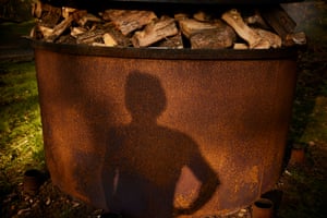 Kelbrick's silhouette on a bag of wood