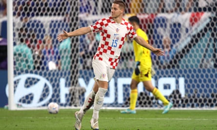 Mario Pasalic of Croatia celebrates scoring the winning penalty in the shootout against Japan.