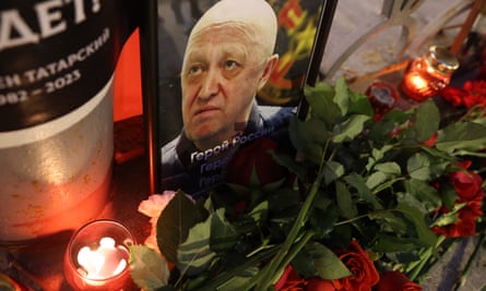 A portrait of politician and warlord Yevgeny Prigozhin seen among candles at an informal memorial for PMC Wagner Group at Varvarka street near the Kremlin on 24 August 2023 in Moscow, Russia.